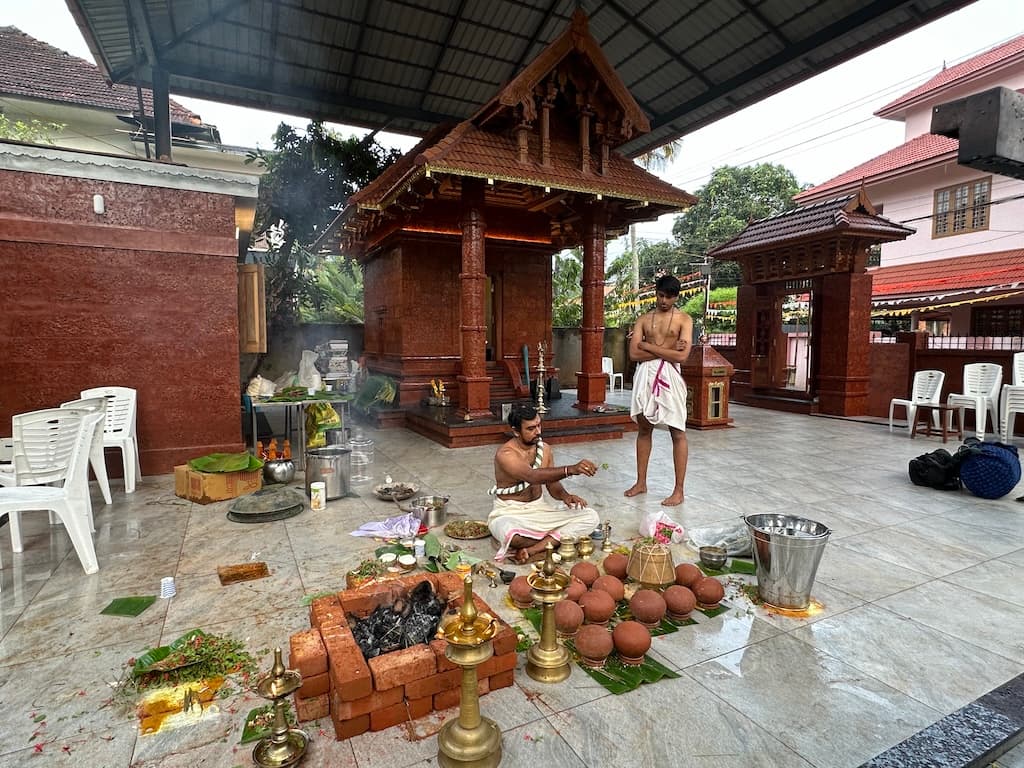 Audience participating in the temple inauguration ceremony.
